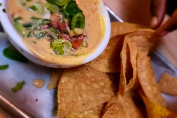 Queso Dip with Crispy Tortilla Chips at Black Tap Craft Burgers & Beer - 35th St, NYC