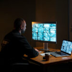 A professional man at a desk, symbolizing the services of Reliable Surveillance Investigation & Civil Services.