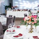 Elegant wedding reception setup featuring beautifully arranged tables and chairs, perfect for memorable celebrations.